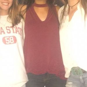 Red high neck top with cutout and lace detail